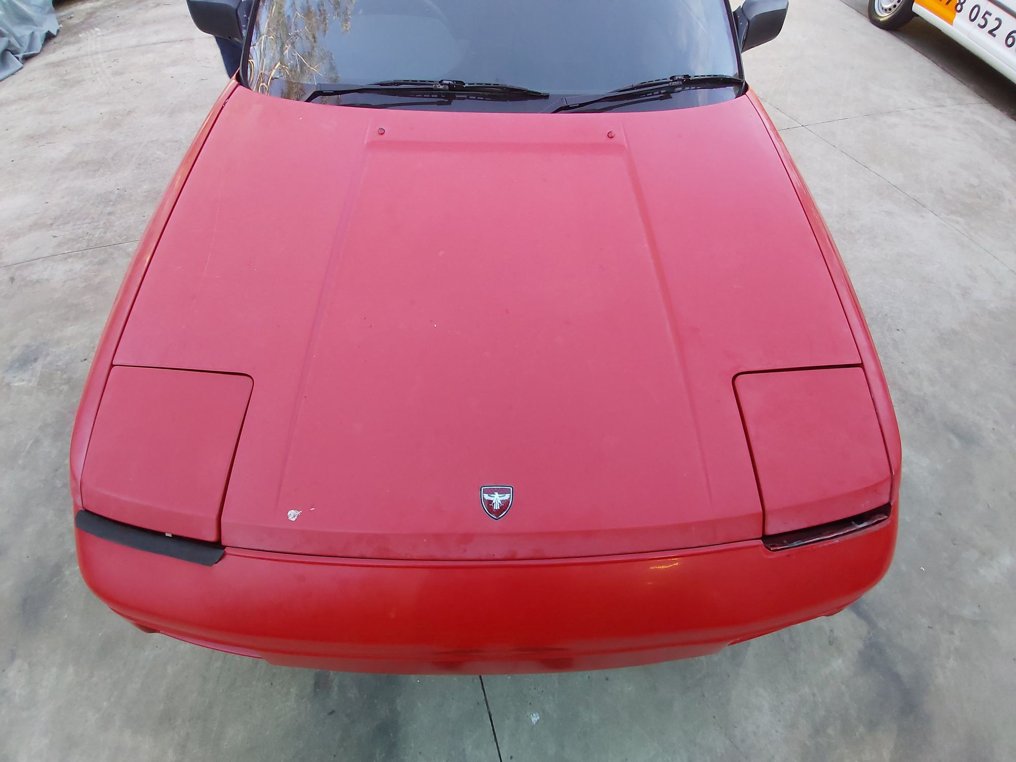 Toyota MR2 bonnet before paint correction · swirl marks and oxidation visible · Sunny Coast Auto Detailing